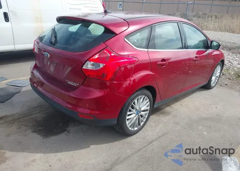 2013 Ford Focus Titanium z USA, uszkodzony, nr VIN 1FADP3N2XDL209491